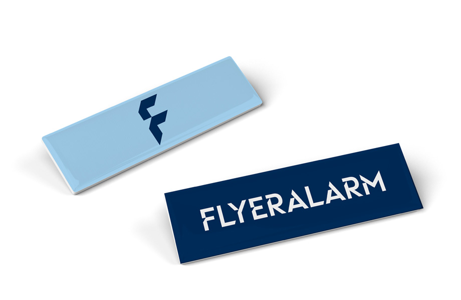 Firmenanstecker Doming, 7 x 2 cm